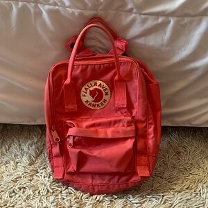 Pink mini FjallRaven Kånken backpack